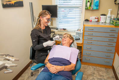 woman getting dental care at Pocock Family Dental