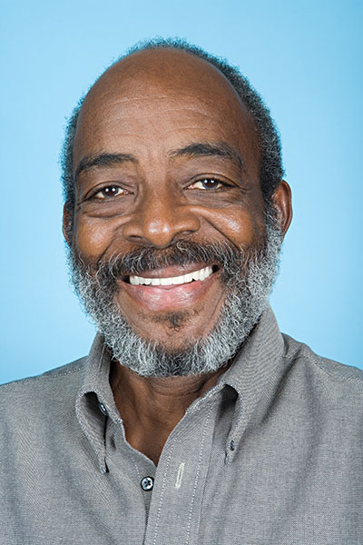 man loving the look of his new dentures from Pocock Family Dental