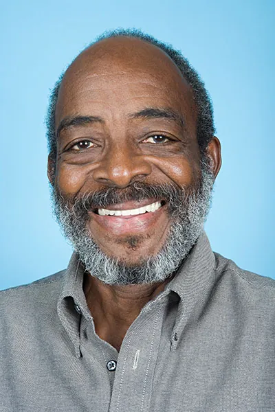 man loving the look of his new dentures from Pocock Family Dental