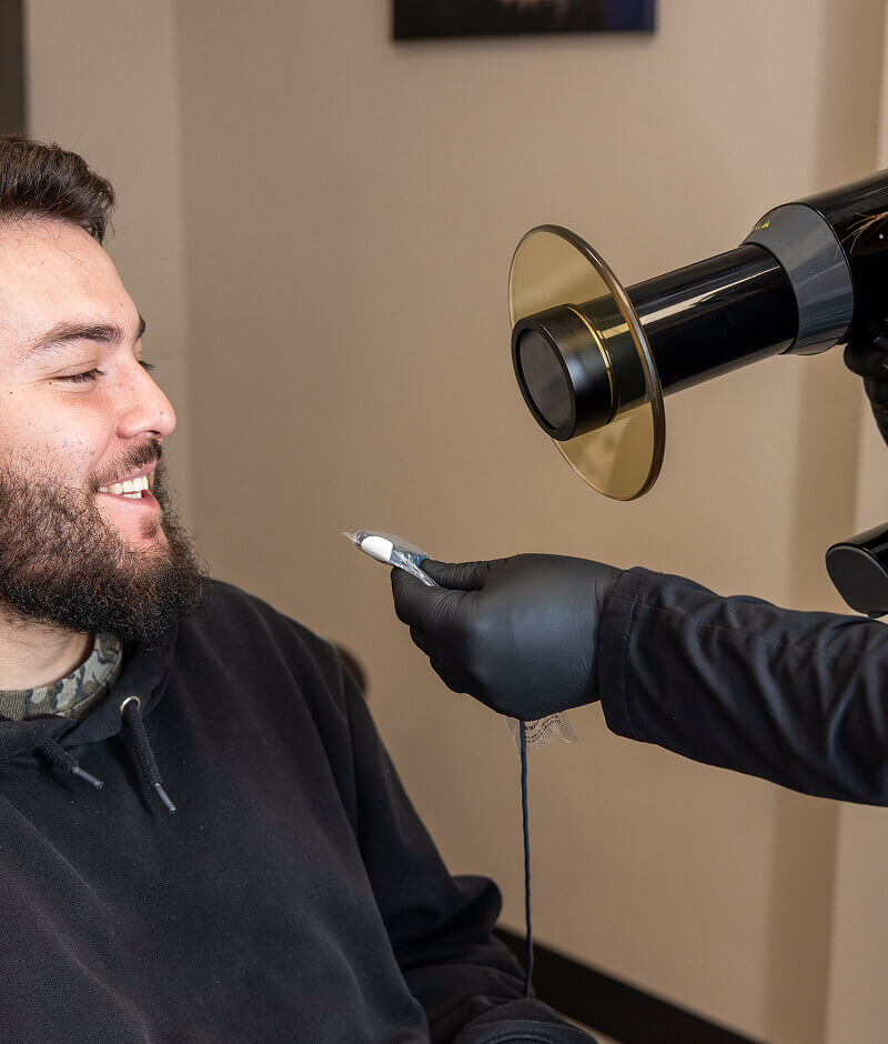 A patient sitting in an exam chair at Pocock Family Dental in Twin Falls ID.